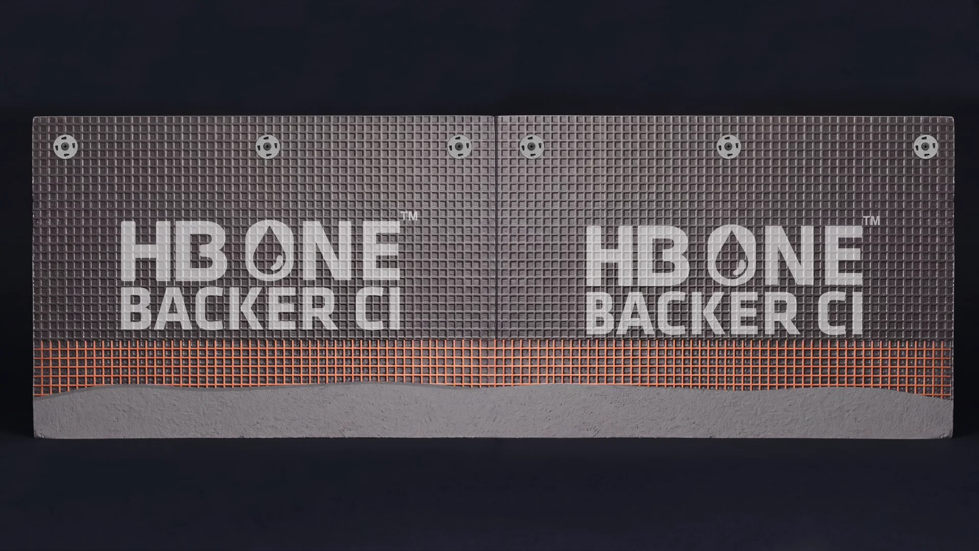 Exploded-View Wall System Animation for an Insulated Backer Board Still from the animation: mesh tape over the joint and the base coat starting to cover the boards
