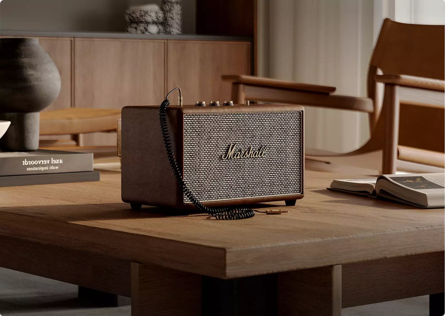 3D interior rendering of wooden table with vintage speaker, books, chair, warm natural light