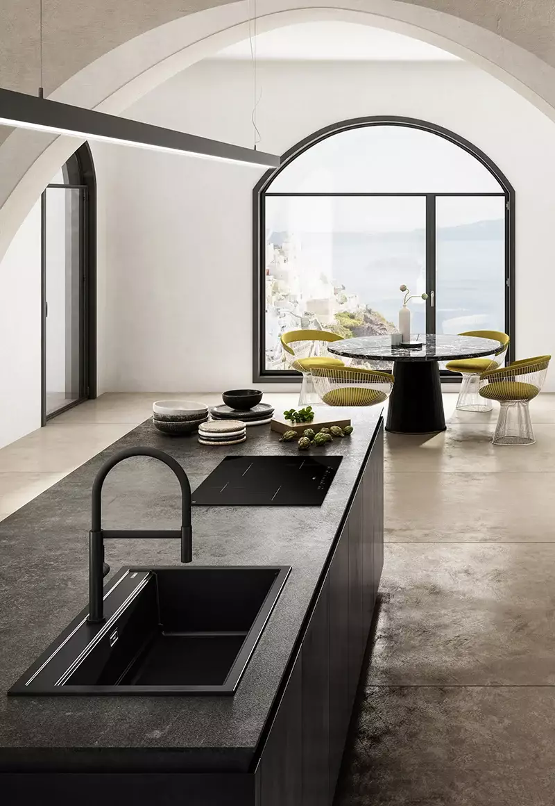 Italian kitchen 3D render with arched windows, black island, dining table, and sea view