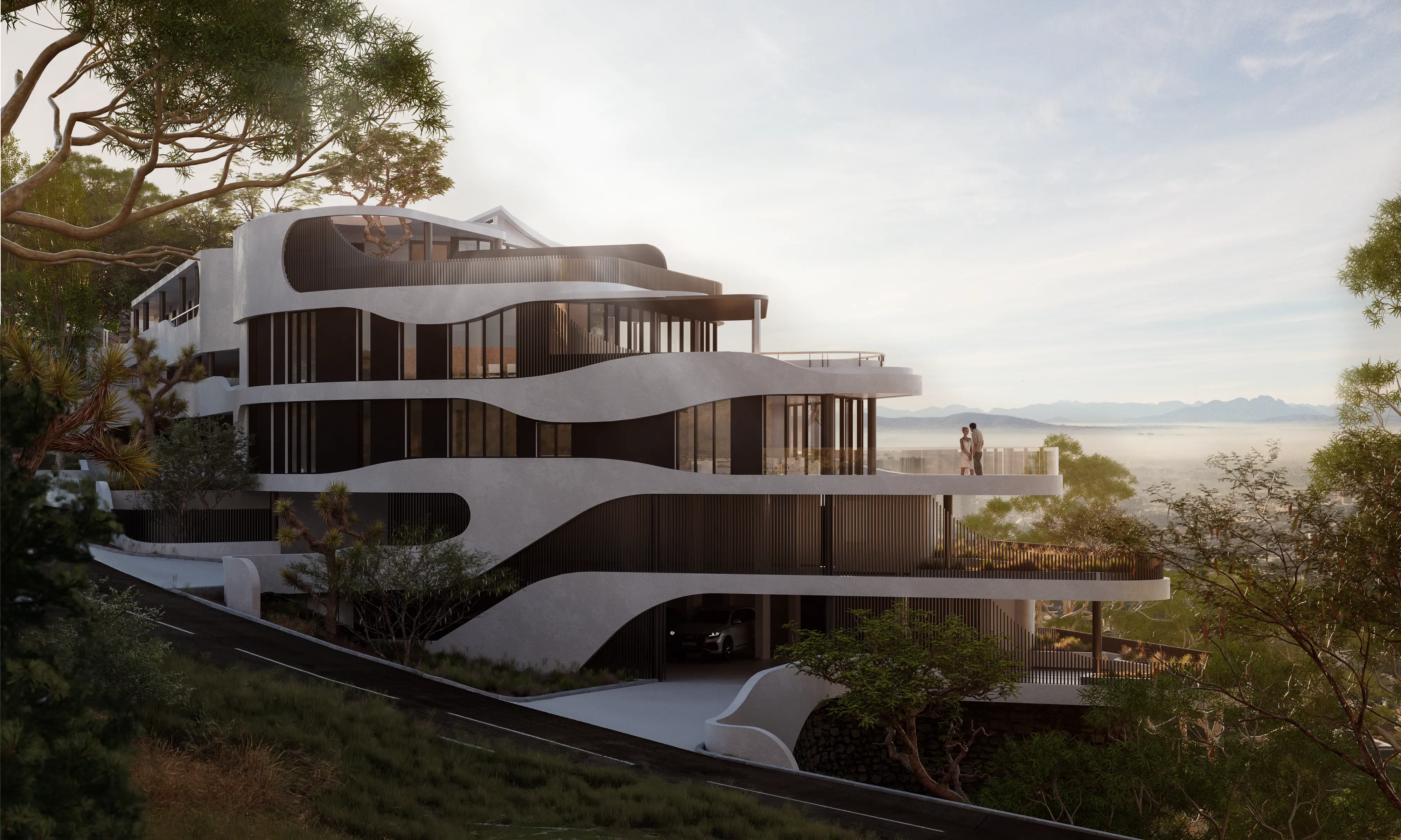 Contemporary hillside residential complex with curved balconies and panoramic landscape views