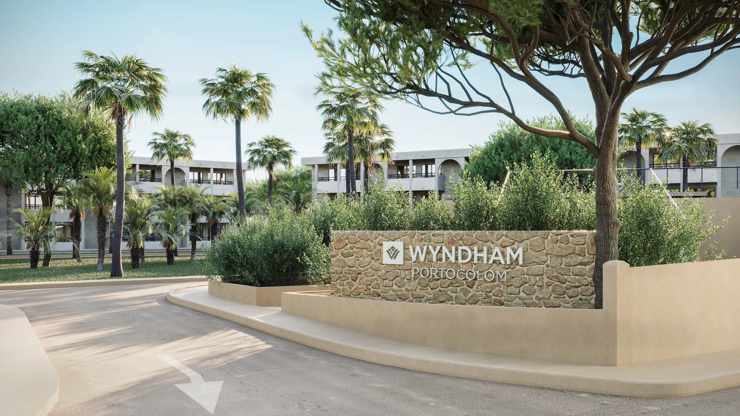Residential entrance signage with landscaped greenery and modern architecture