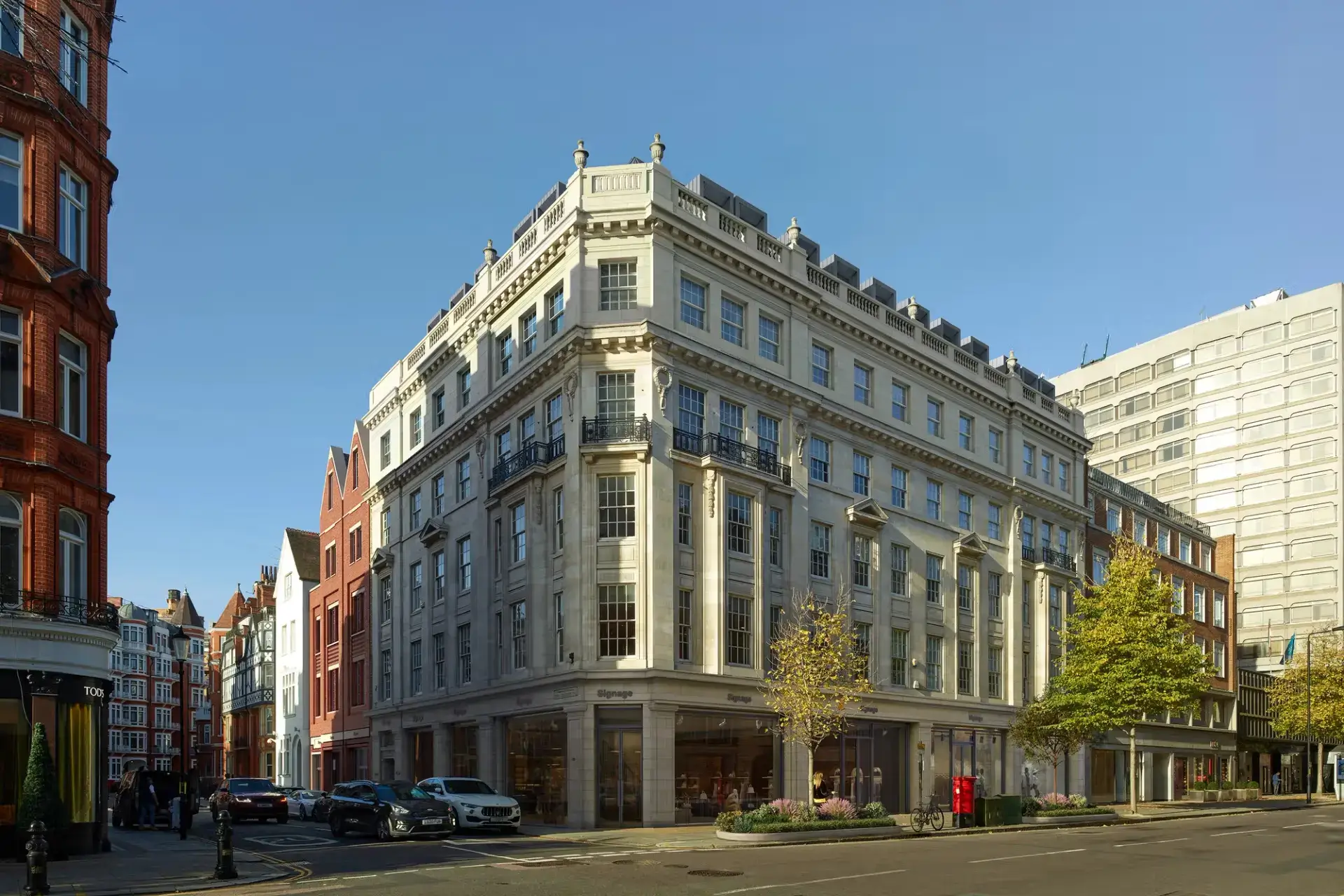 Corner mixed-use urban building in daylight featured in a 3D architecture portfolio