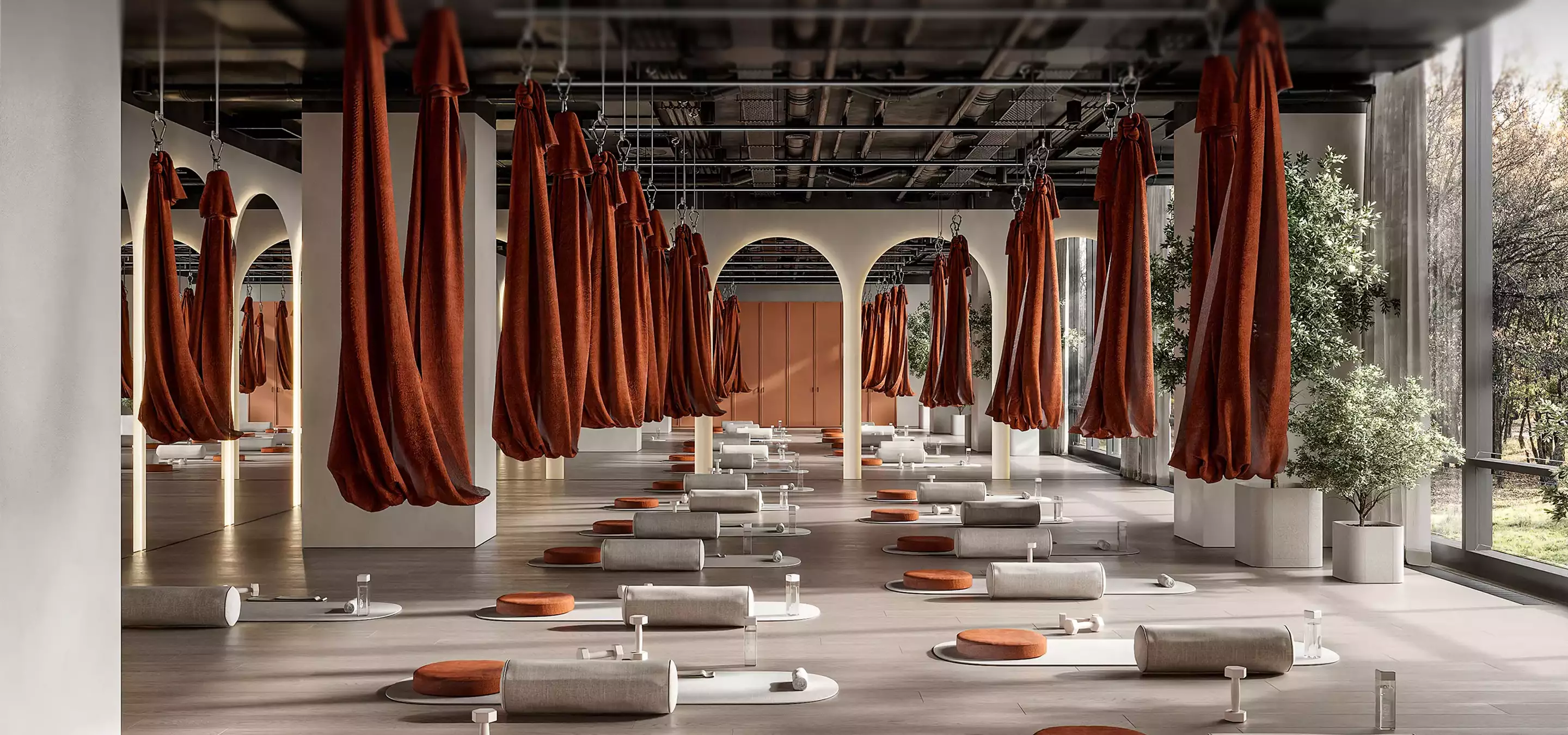 Spacious interior studio with hanging fabric swings and mats, Best 3D Rendering Software for Interior Design in 2026