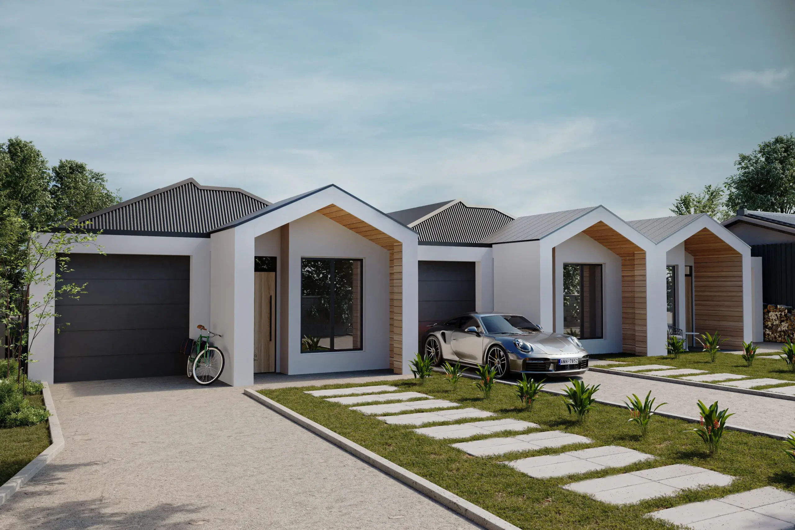 Row of modern single-story houses in a suburban setting with driveways, garages, and landscaped front yards