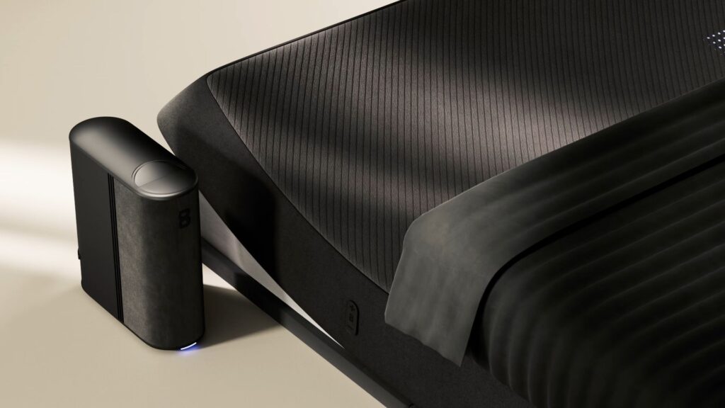 Product rendering of a black smart bed with a temperature-control hub