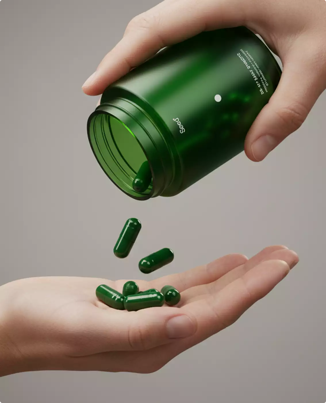 Green capsules pouring from open Seed jar into hand on neutral background, supplement packaging design