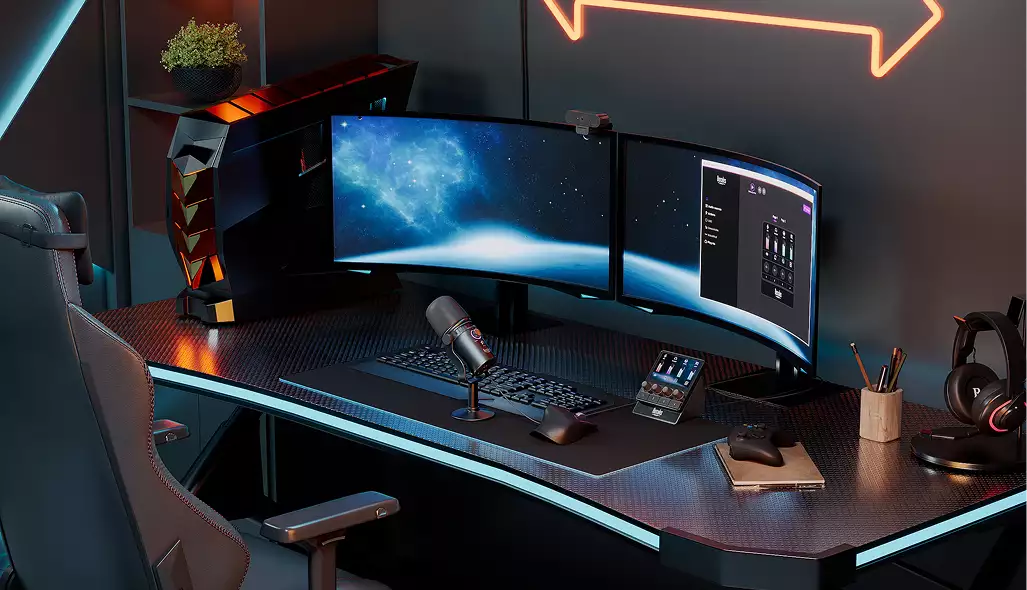 3D product rendering services for a black gaming desk with curved dual monitors, mic, and headset stand