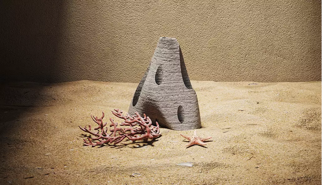 Stone cone sculpture with oval holes on sand beside coral branch and starfish against wall, concept for 3D product renderings