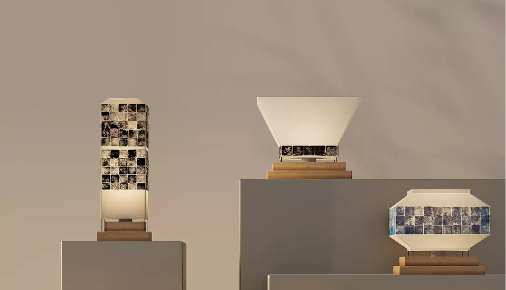 Three geometric tile band table lamps on display pedestals against neutral wall for 3D product visualization