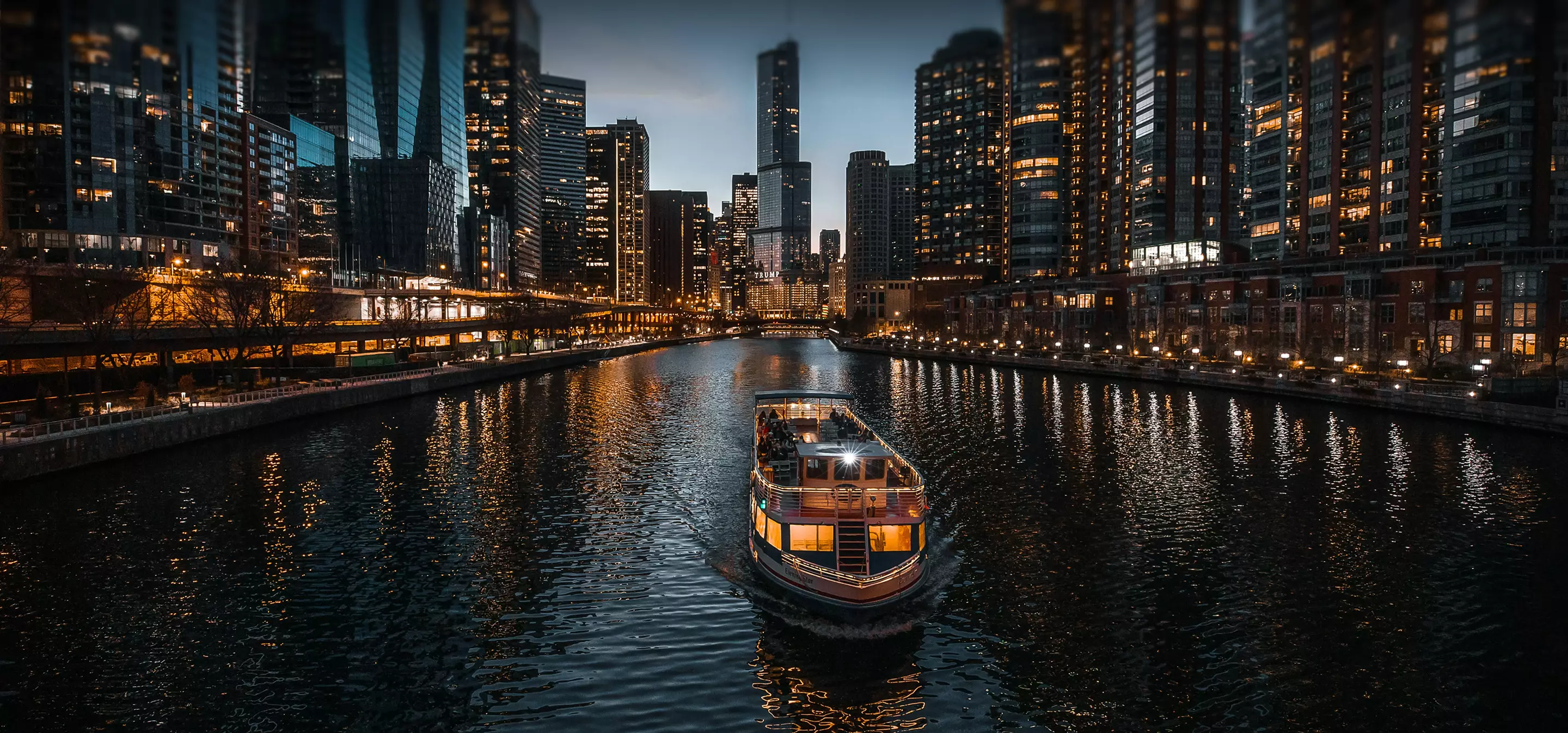 Chicago river at night with lit skyline and tour boat, 3D Rendering Chicago Cover with Night River Skyline
