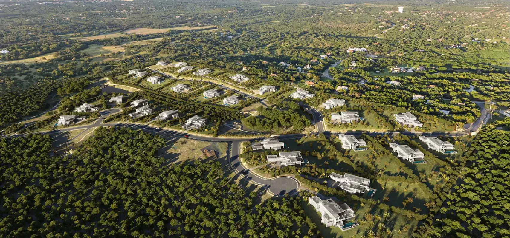Birds eye rendering of a large hillside housing development with curving streets, villas, and surrounding trees.