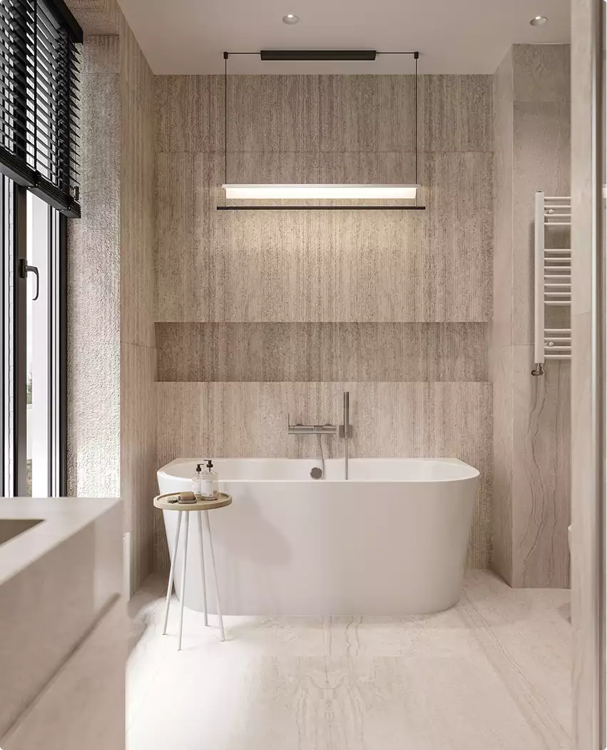 Birds eye rendering of a modern bathroom with freestanding tub, stone walls, and soft linear lighting