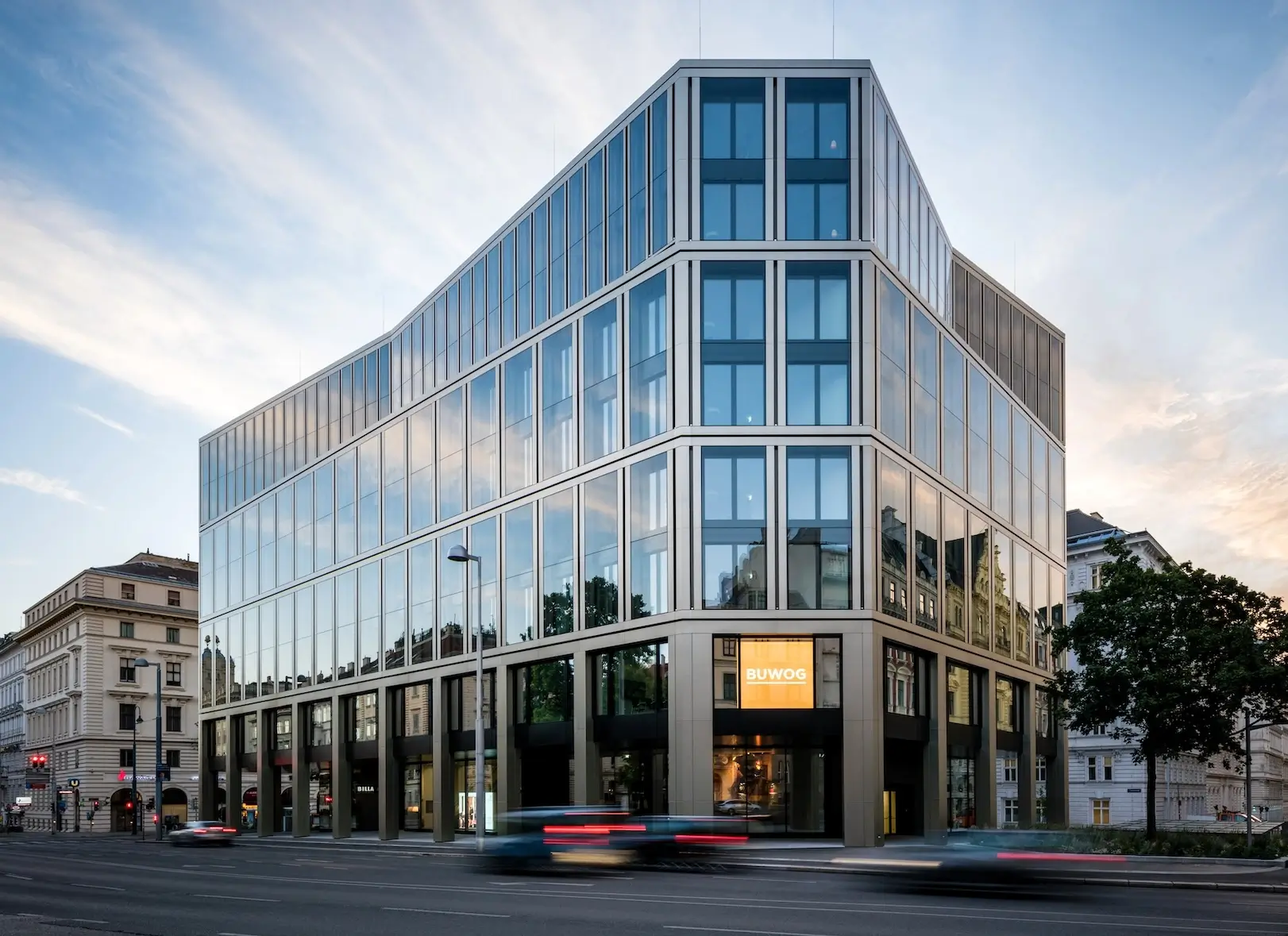 Commercial architectural rendering services image of a modern mixed-use building with glass facade