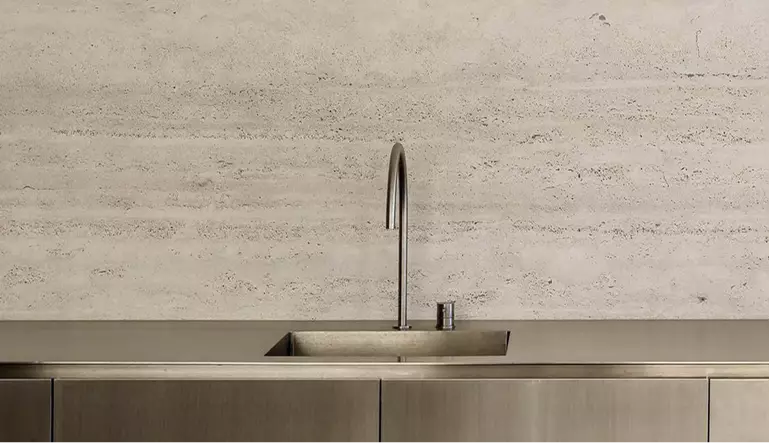 Minimal sink wall in exhibition booth visualization with metal counter, faucet and stone backdrop