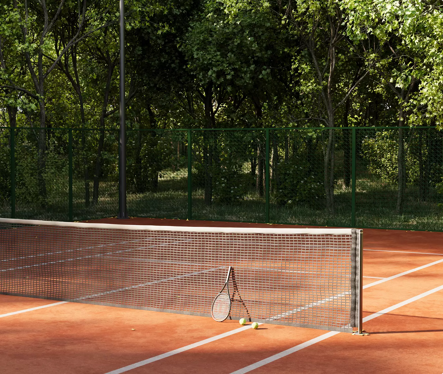 Clay tennis court design surrounded by green forest fence, net with racket and balls in sunlight