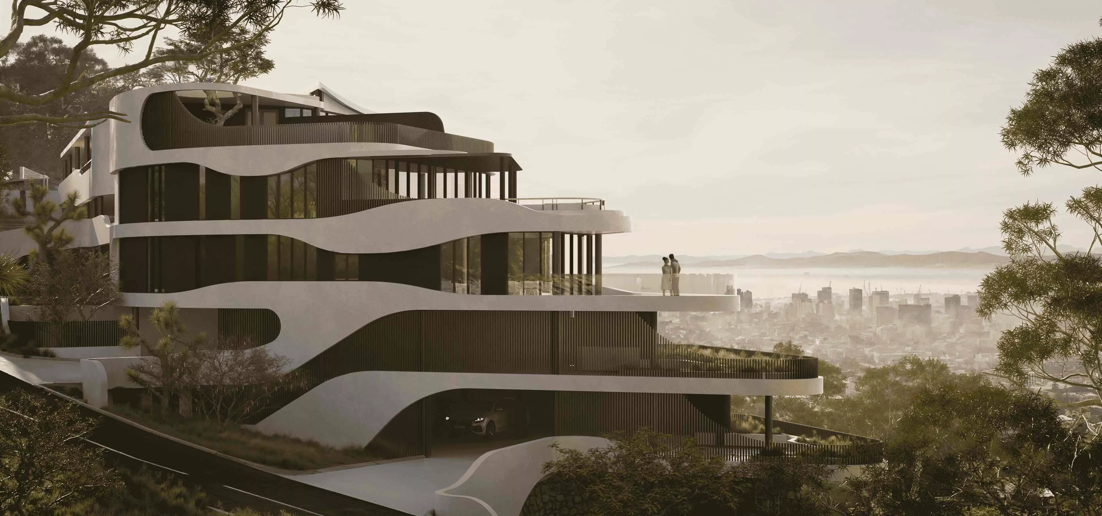 Hotel exterior of a modern hillside tower with curved terraces, glass walls, trees, and city skyline view