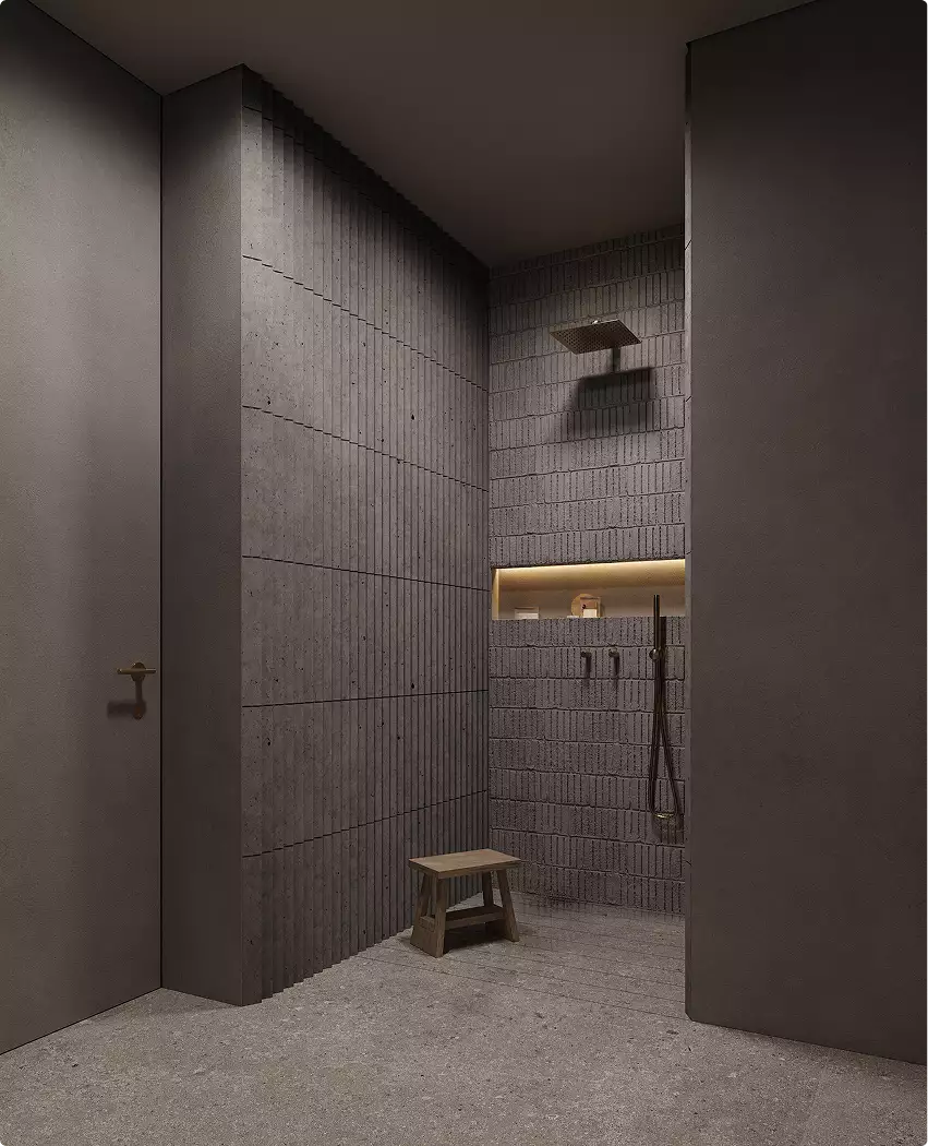 Interior modular homes shower with textured tile walls, recessed shelf, stool, and hand shower