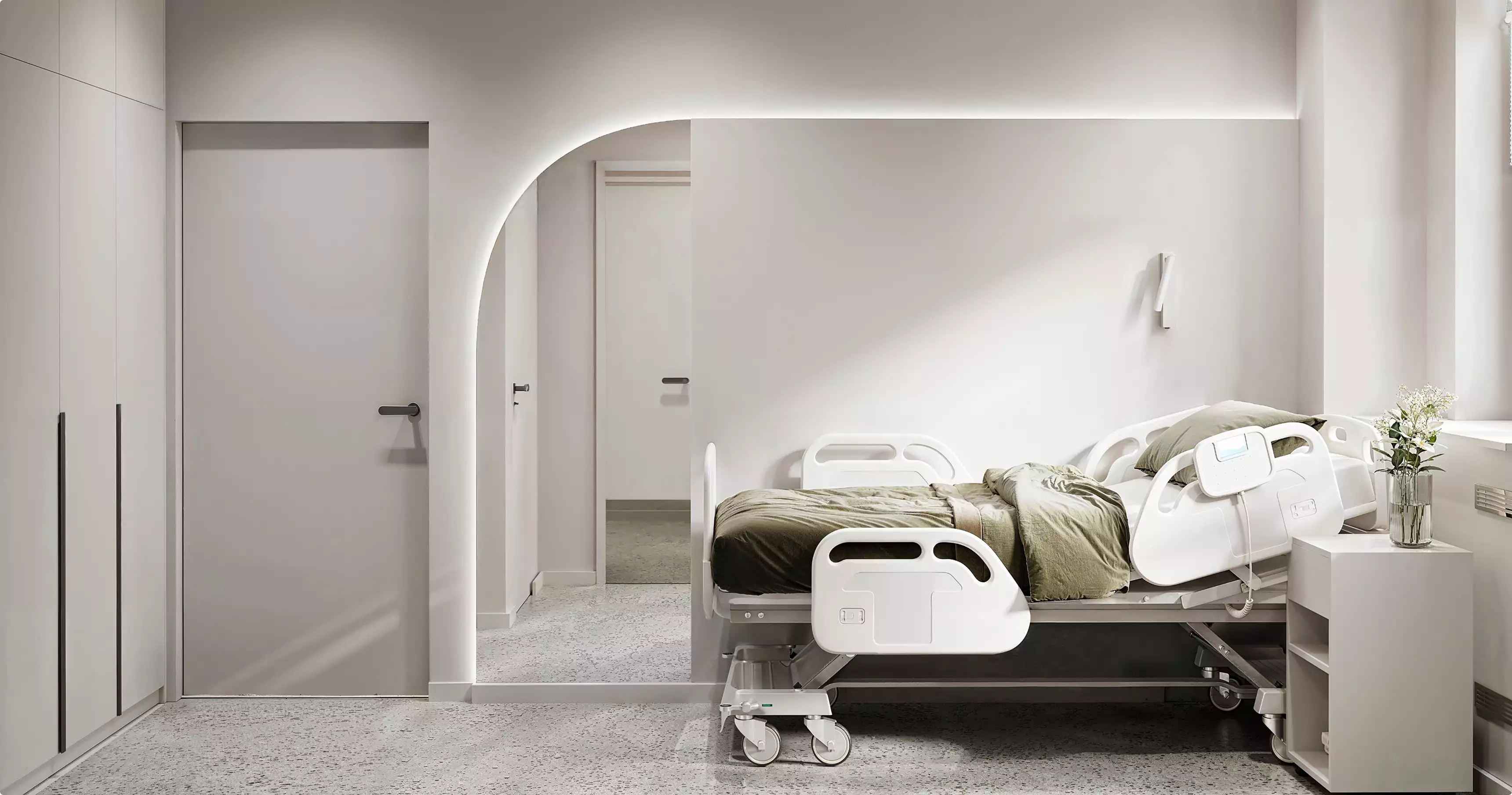 Medical center renderings of a patient room with hospital bed, side table, and arched doorway