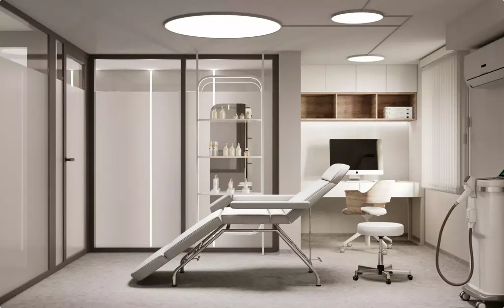 Medical center visualization of a treatment room with exam chair, desk, shelving, and round ceiling lights