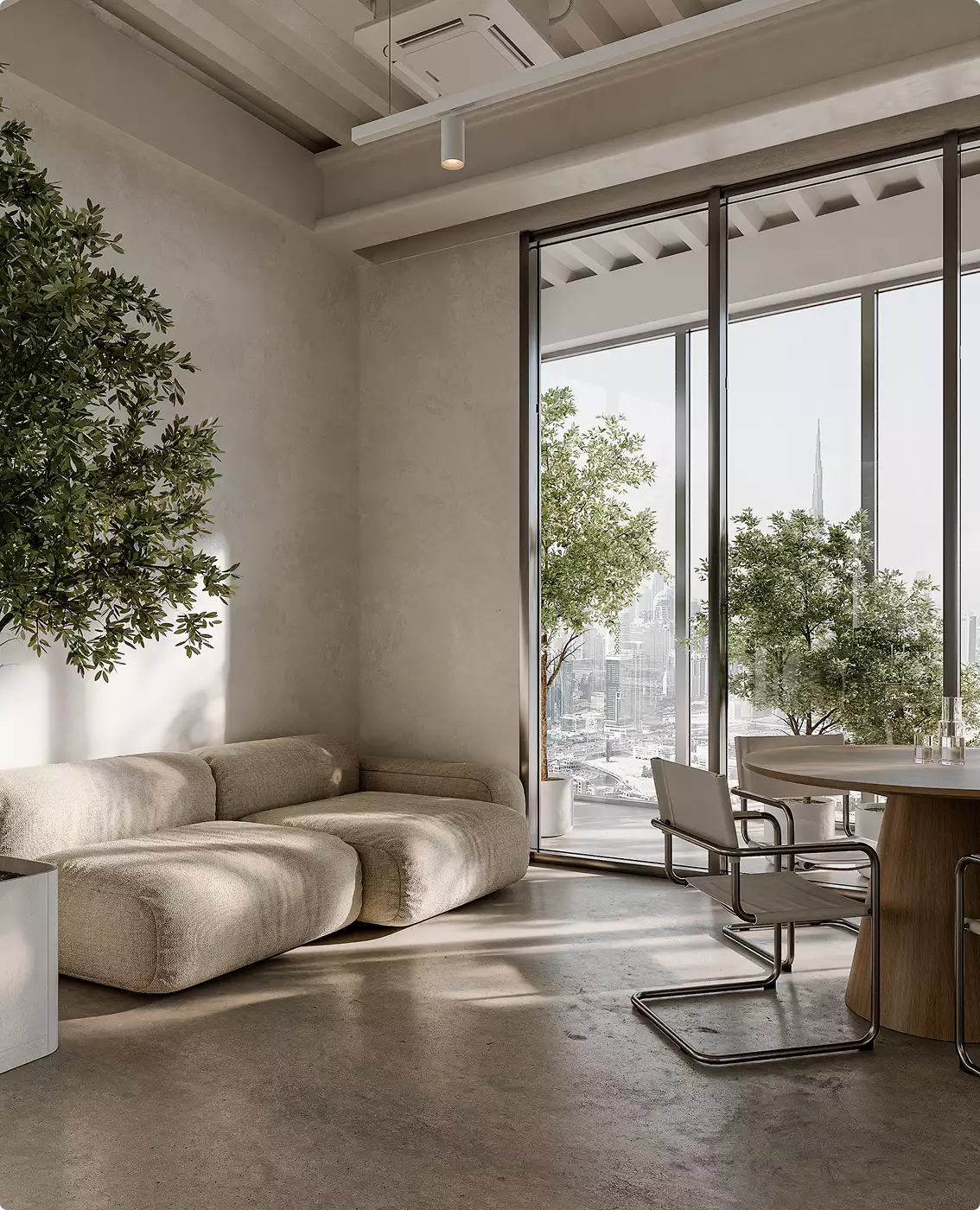 Office interior tour of a lounge area with sofa, round table, potted trees, and city-view windows