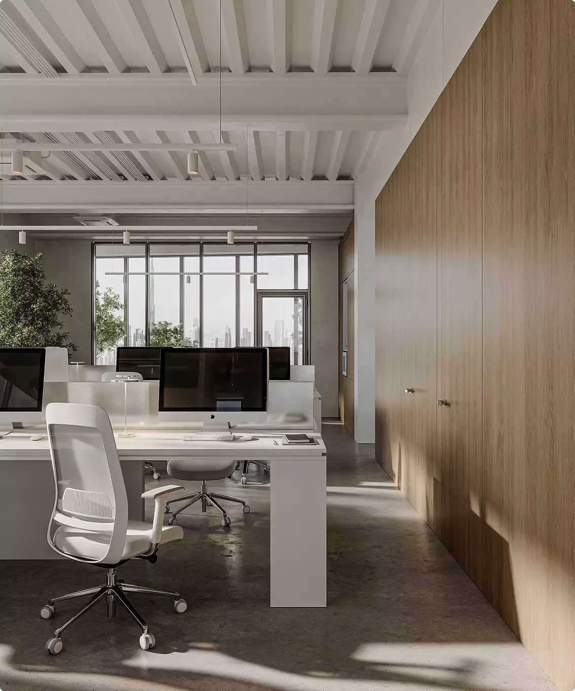 Office interior tour of an open workspace with white desks, desktop monitors, and wood storage wall