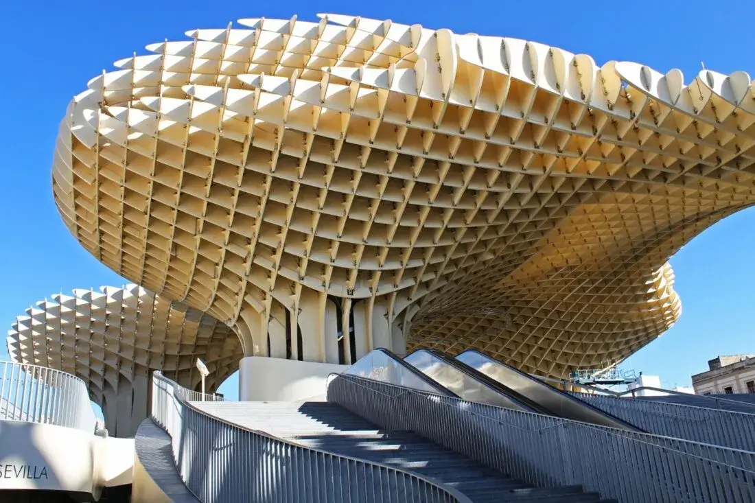 Parametric architectural style structure with honeycomb canopy forming modern sculptural building design