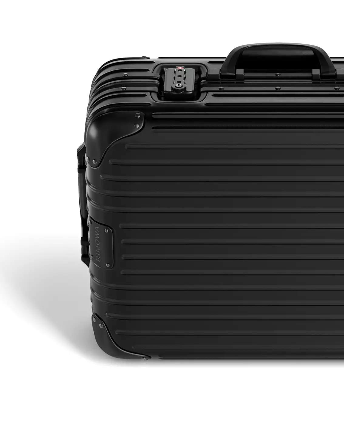 Product design rendering of a black suitcase corner with top handle and lock detail