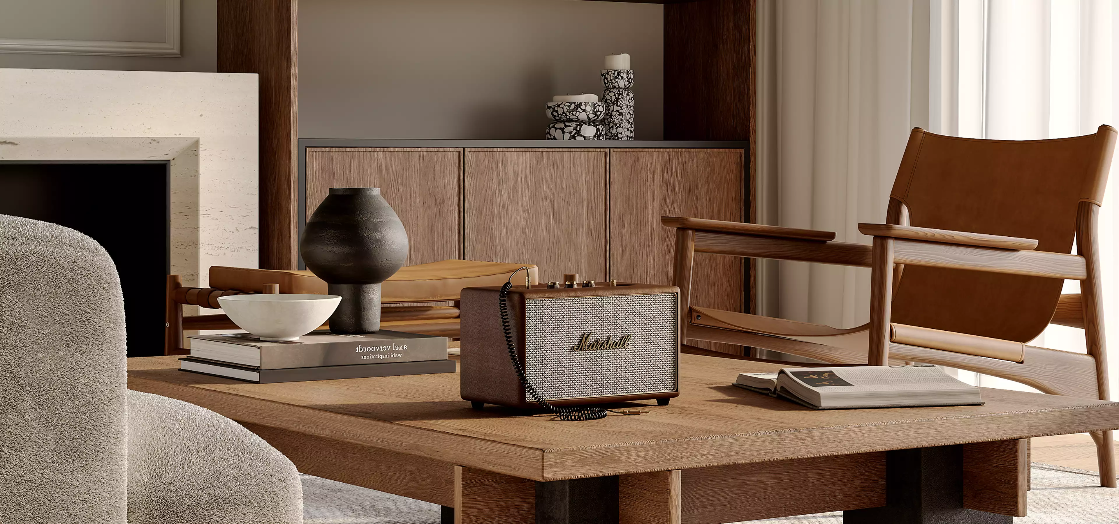 3D product rendering service example showing speaker on wooden coffee table with books, decor, and lounge chairs