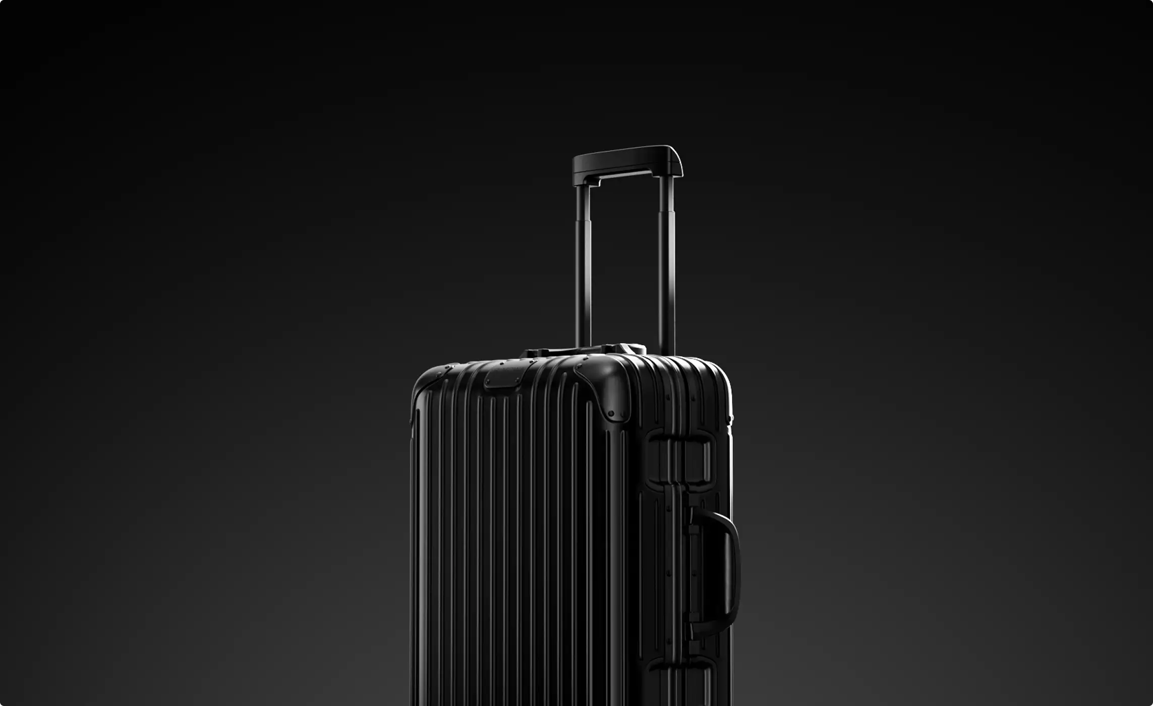 Product visualization services for a black suitcase with extended handle on a dark background