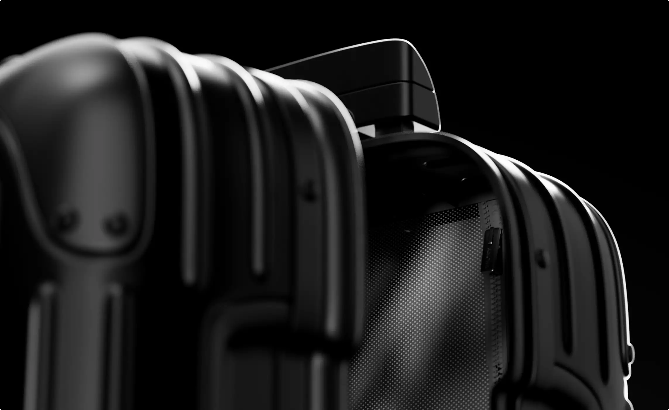 Product visualization services showing a close-up of an open black suitcase on a dark background