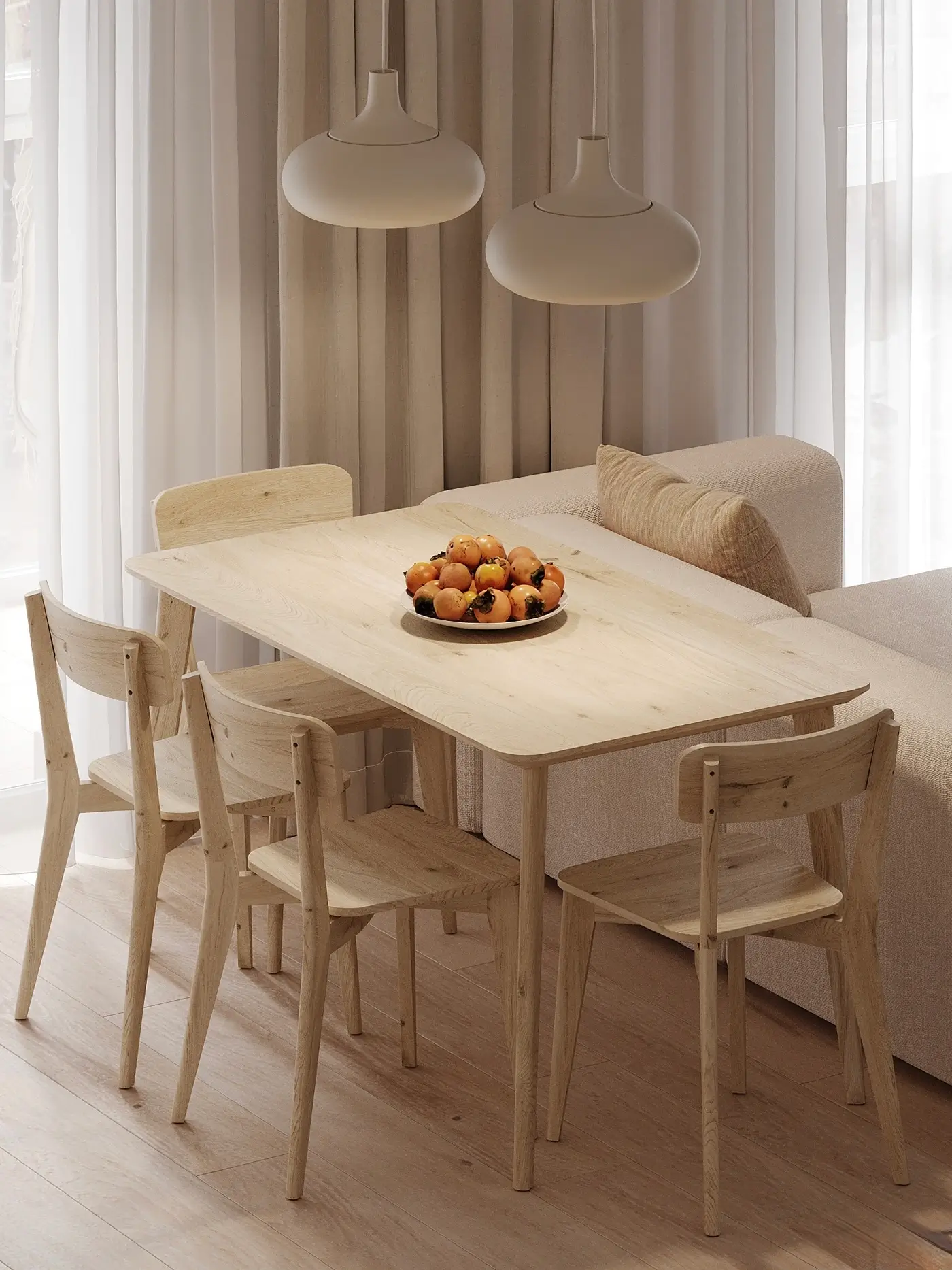 What Is Scandinavian Style? Key Characteristics and Design Ideas Scandinavian style dining area with pale wood table, four chairs, pendant lights, and neutral curtains