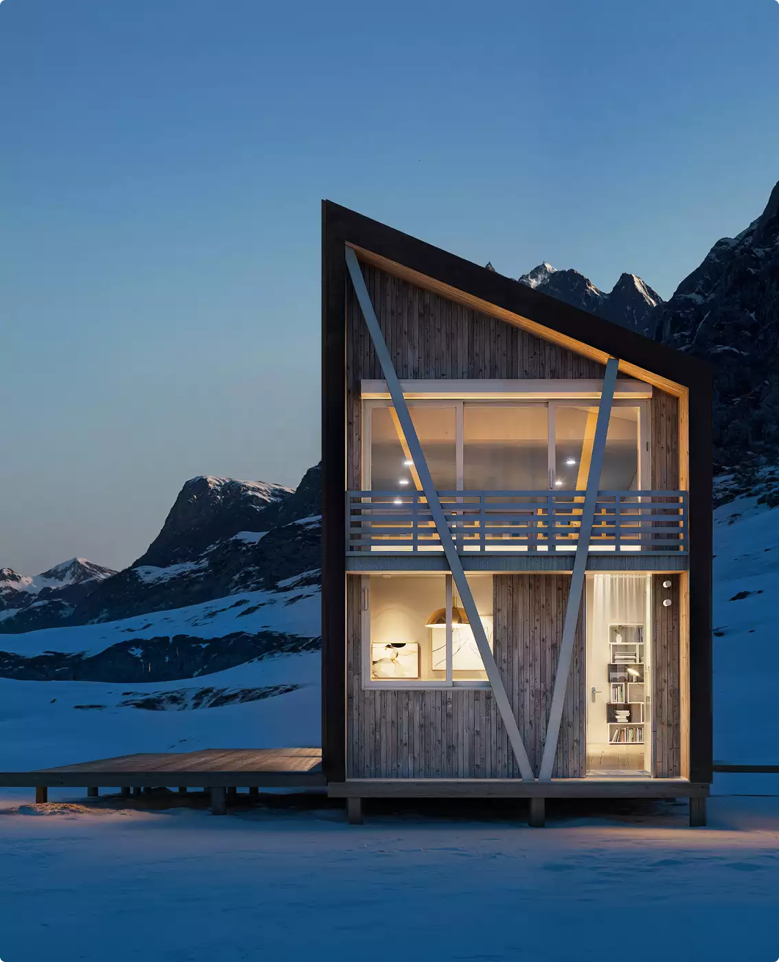 Winter night renders of a lit modern cabin facade against snowy mountains and a deep blue sky