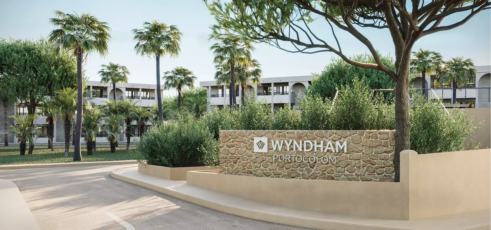 3d architectural rendering of entrance sign with Wyndham Portocolom text and landscaped surroundings