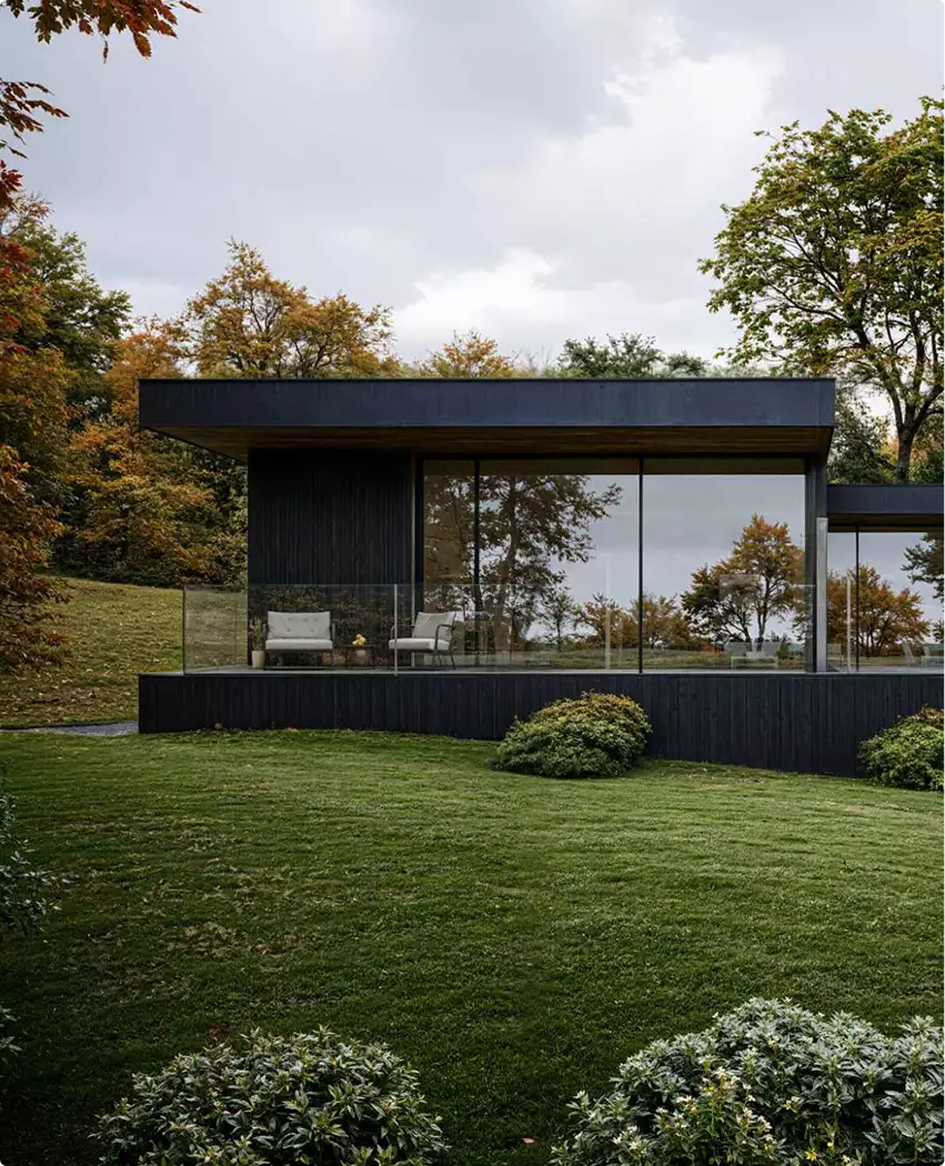 3d rendering for building permit with modern house facade, large window and outdoor seating