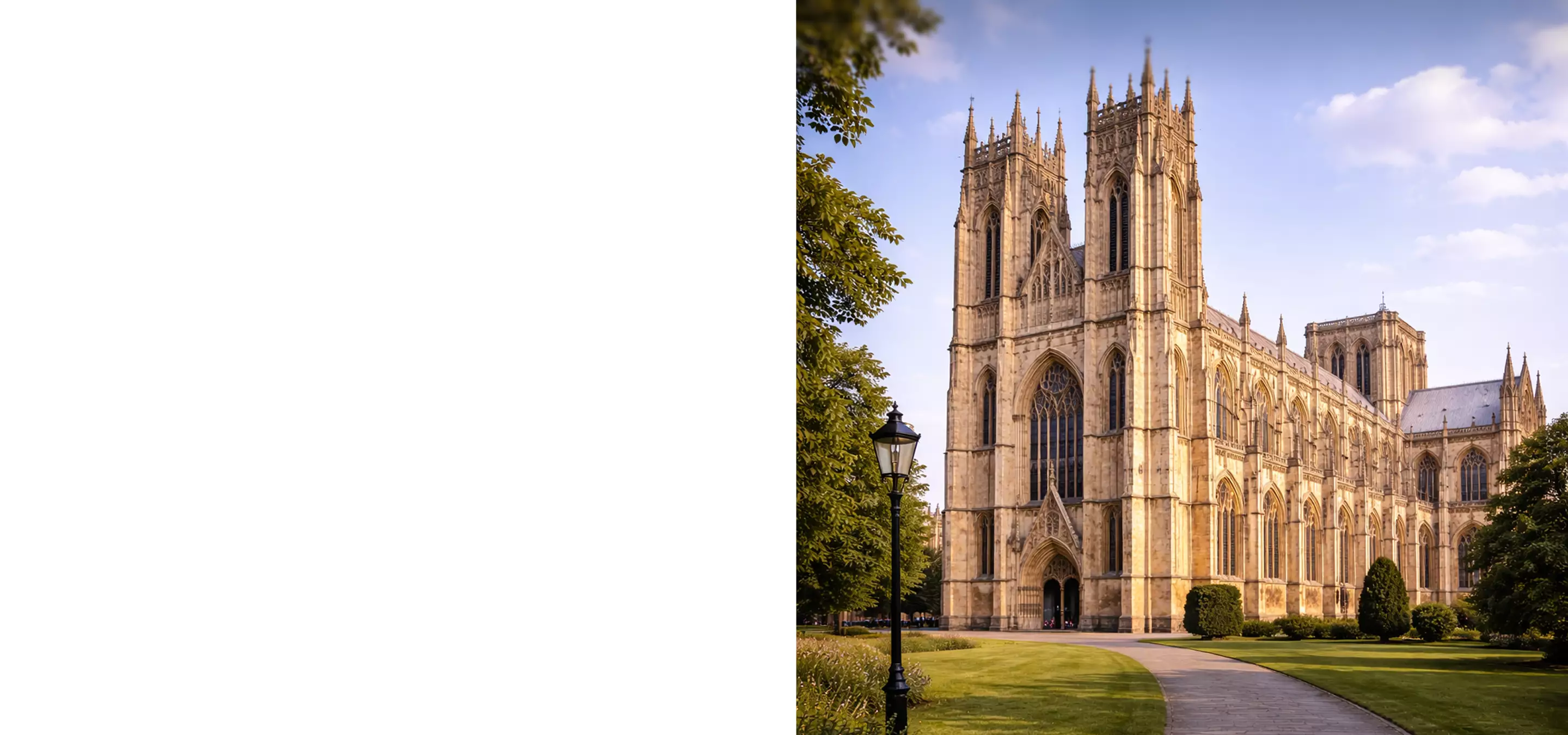 Side view of a Gothic cathedral with pointed arches, tall windows, buttresses, and twin towers