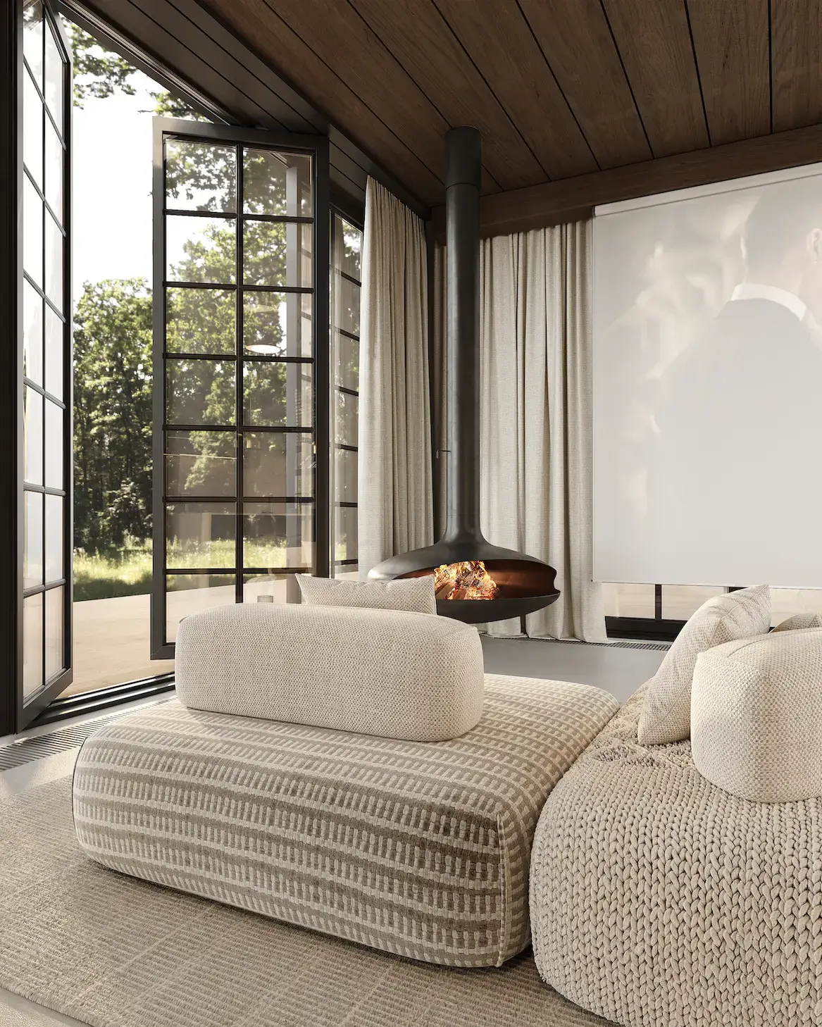 cozy modular house living room with suspended fireplace and forest view