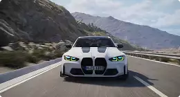 Automotive marketing rendering service white sports sedan driving on a mountain road, front view