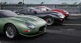 Automotive studio rendering service lineup of vintage sports cars parked on a wet track