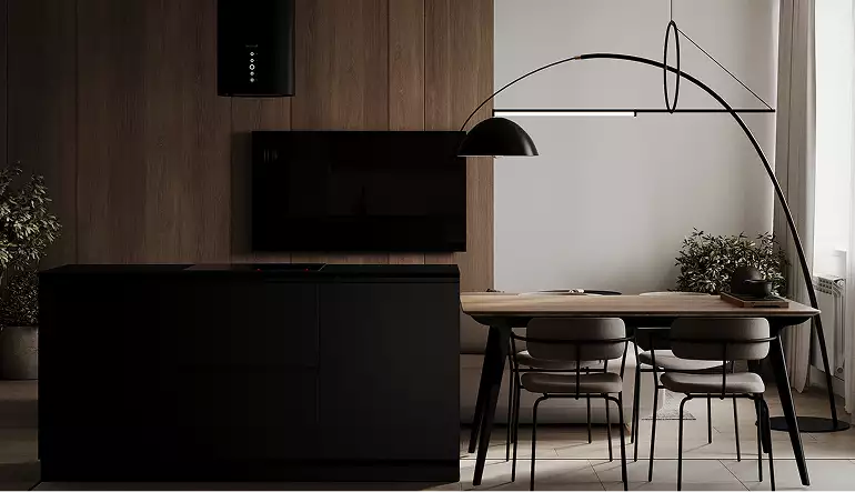Dining space with wood table, chairs and large arc lamp by window, black apartment design
