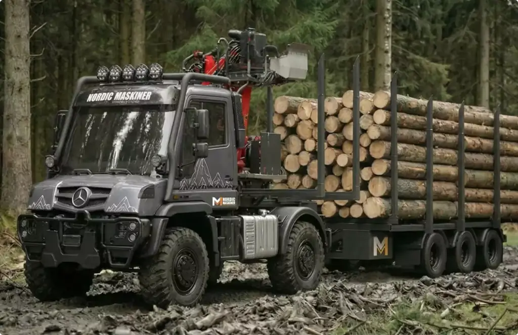 High-end automotive rendering service forestry truck loaded with logs on rough ground in woodland