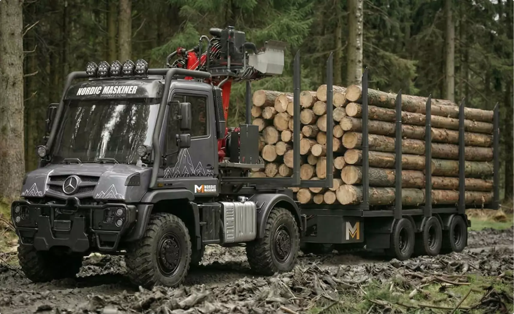 Logging machine product visualization truck carrying stacked logs in dense forest setting