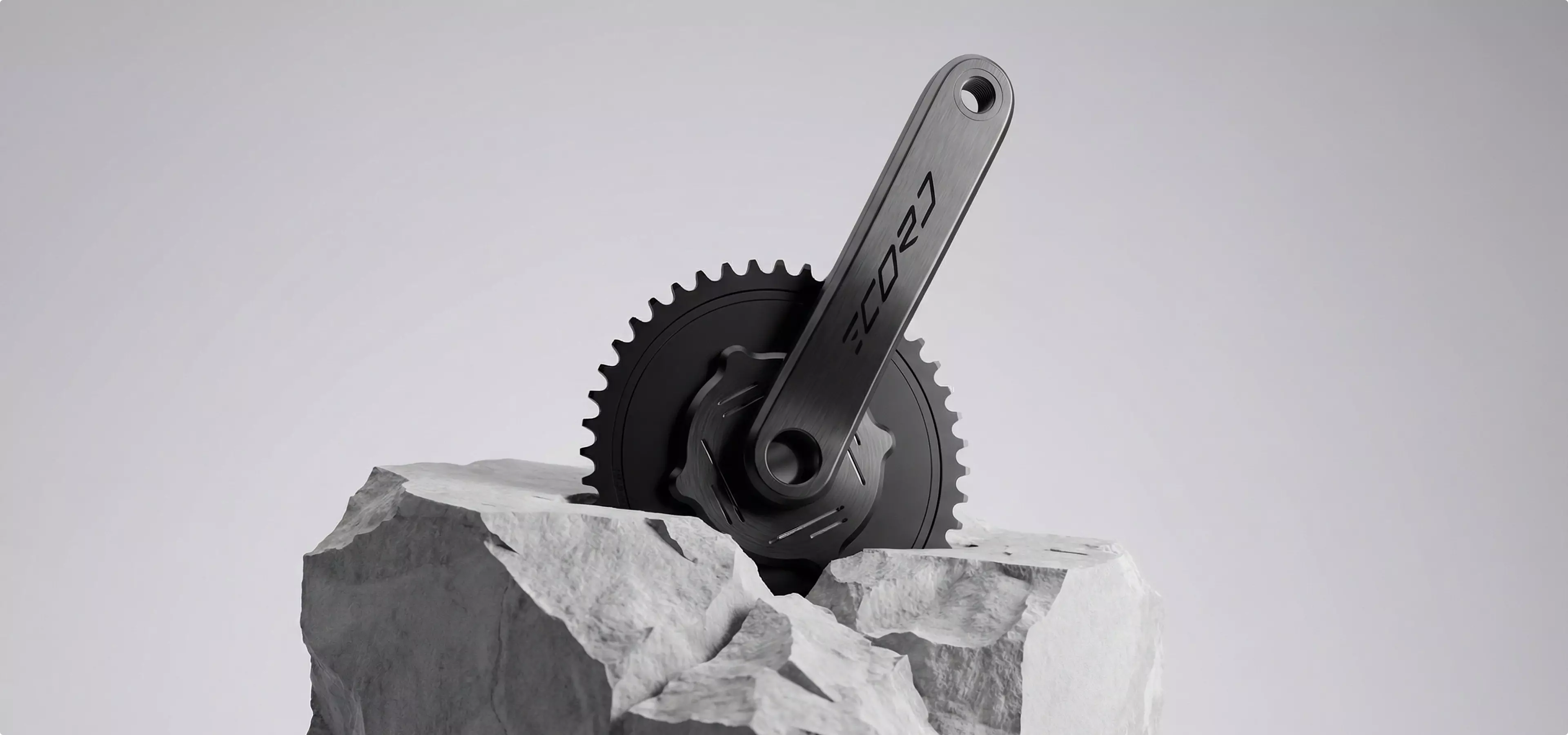 Bicycle crankset on stone blocks Product modeling studio setup with gear detail