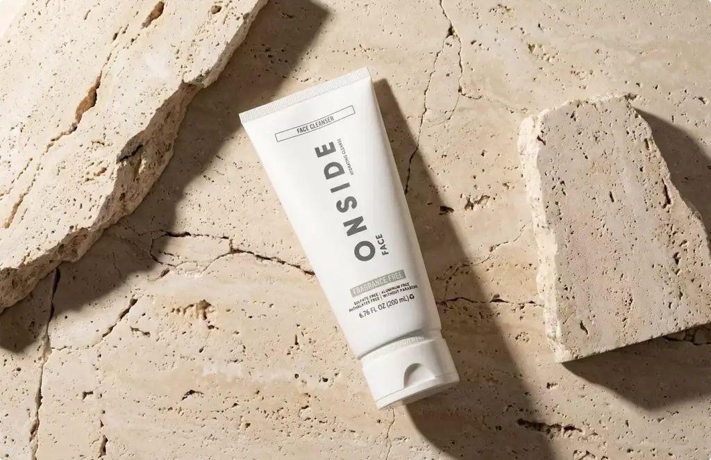 Onside face cleanser tube on stone Product modeling skincare packaging layout