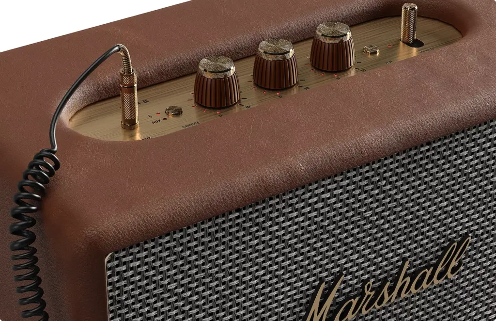 Vintage style amplifier with knobs and textured grille, product rendering studio lighting