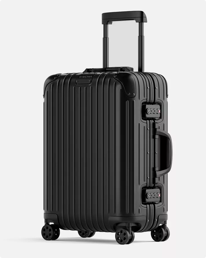 Black hard shell suitcase with handle extended, product rendering on clean background