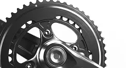 Close-up of mechanical gear and chainring detail, product rendering with clean background