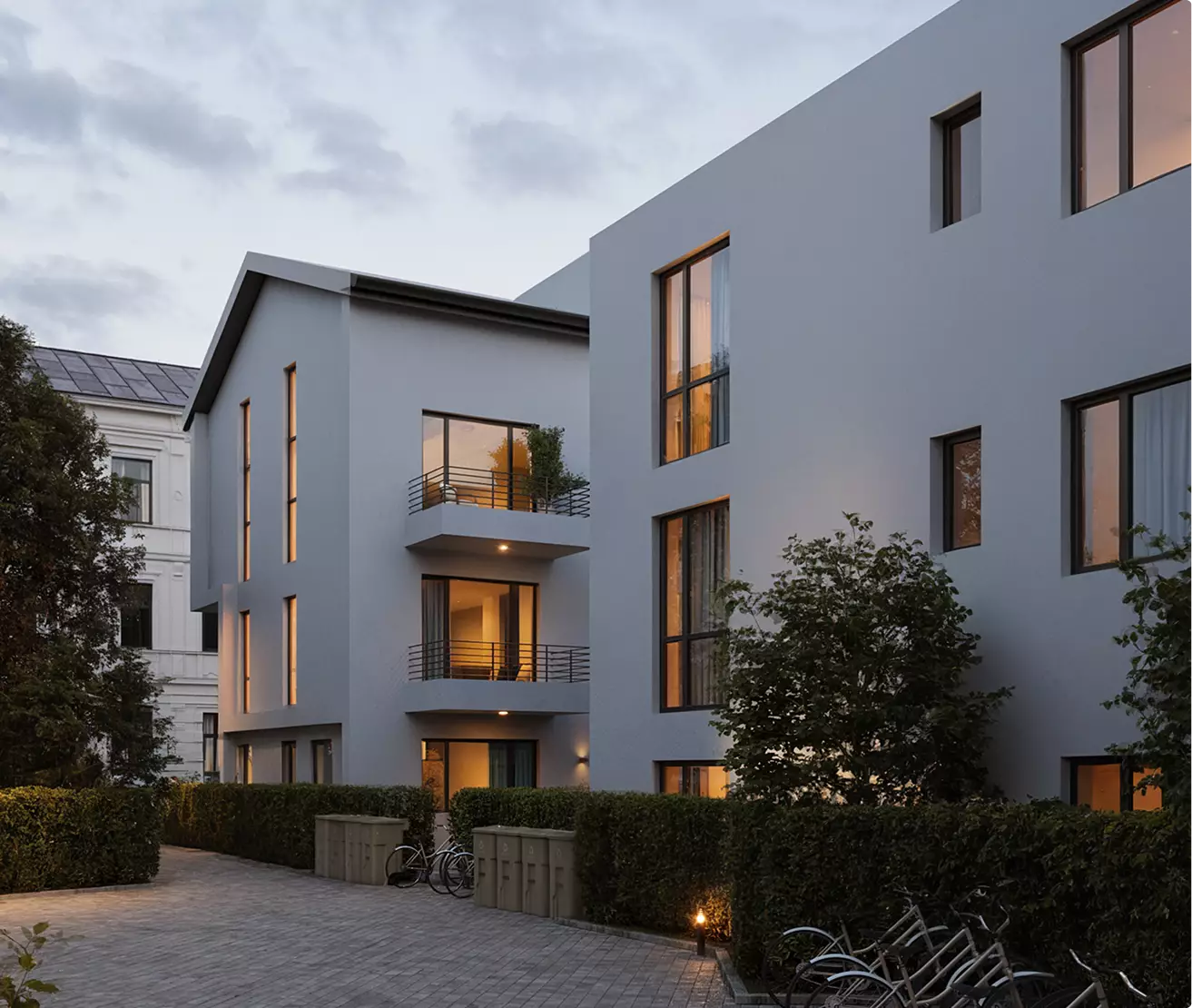 Residential complex 3d rendering side view with balconies, trees, and parked bicycles