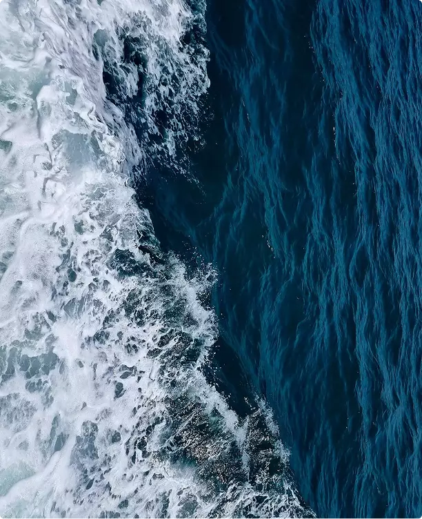 Ocean waves and wake pattern, sailboat 3d rendering context implied by moving vessel nearby