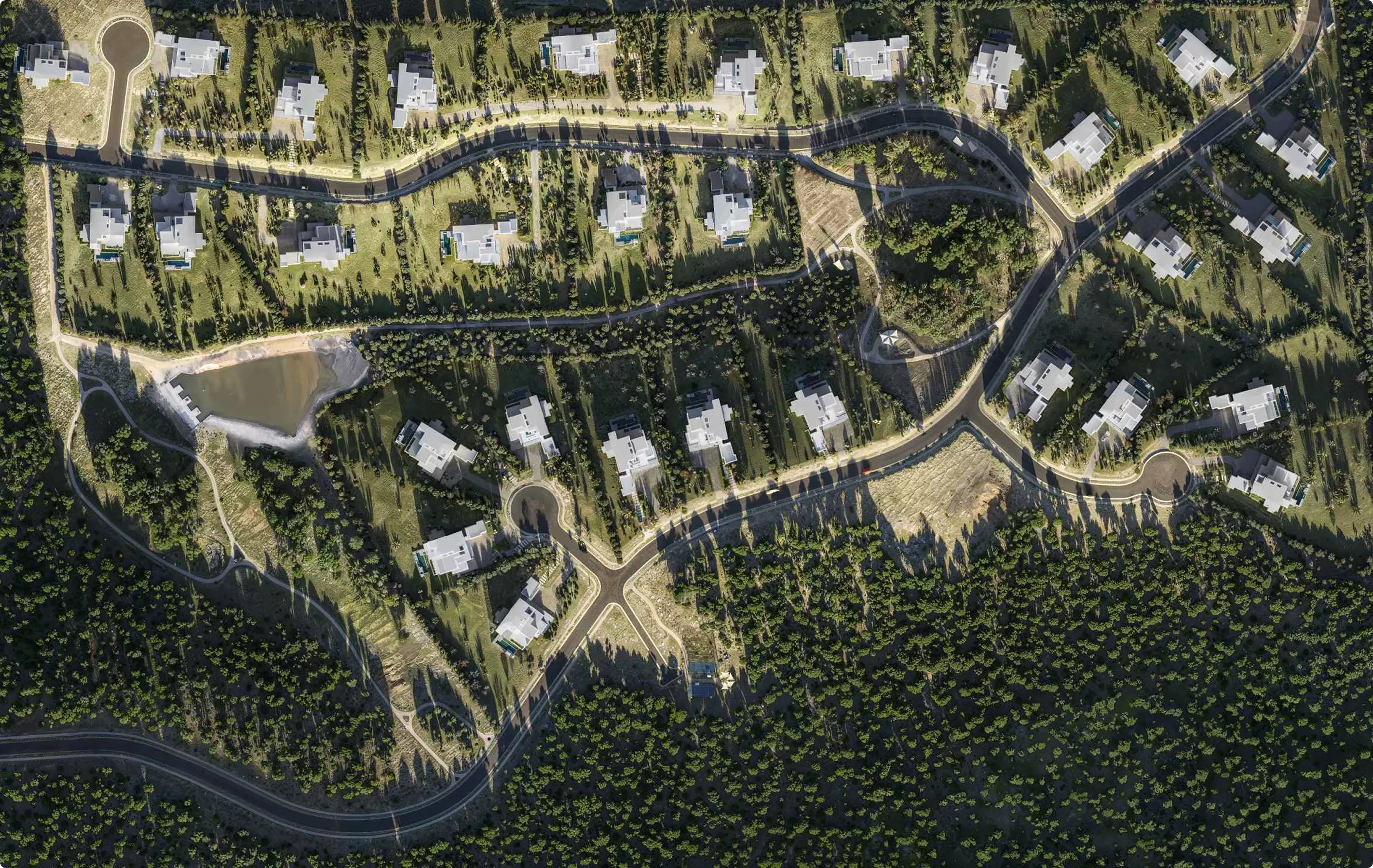 Top view of hillside housing development and roads, Site Plan and Aerial Rendering Services