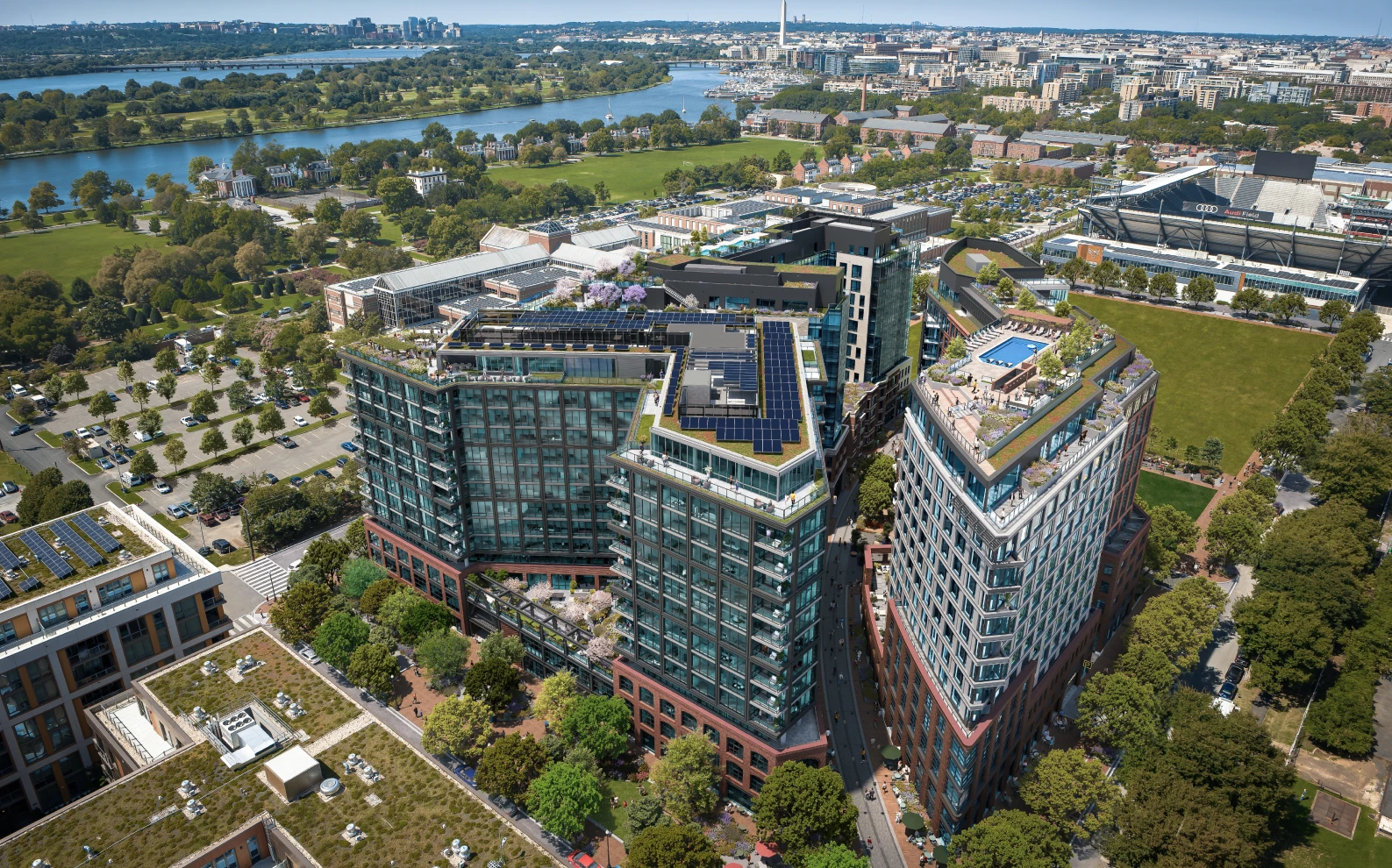Urban mixed use buildings aerial, 3D rendering company USA, river, rooftops and city skyline